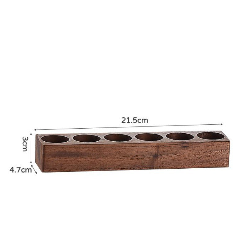 Wooden bean bottle rack with circular openings and 4.7 cm height marking