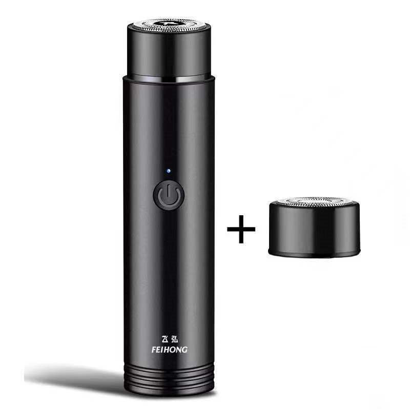 Black portable electric mini shaver with extra replacement foil shaving head.