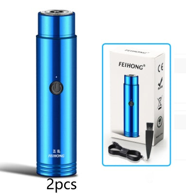 Blue portable electric mini shaver kit with spare head and charging accessories.